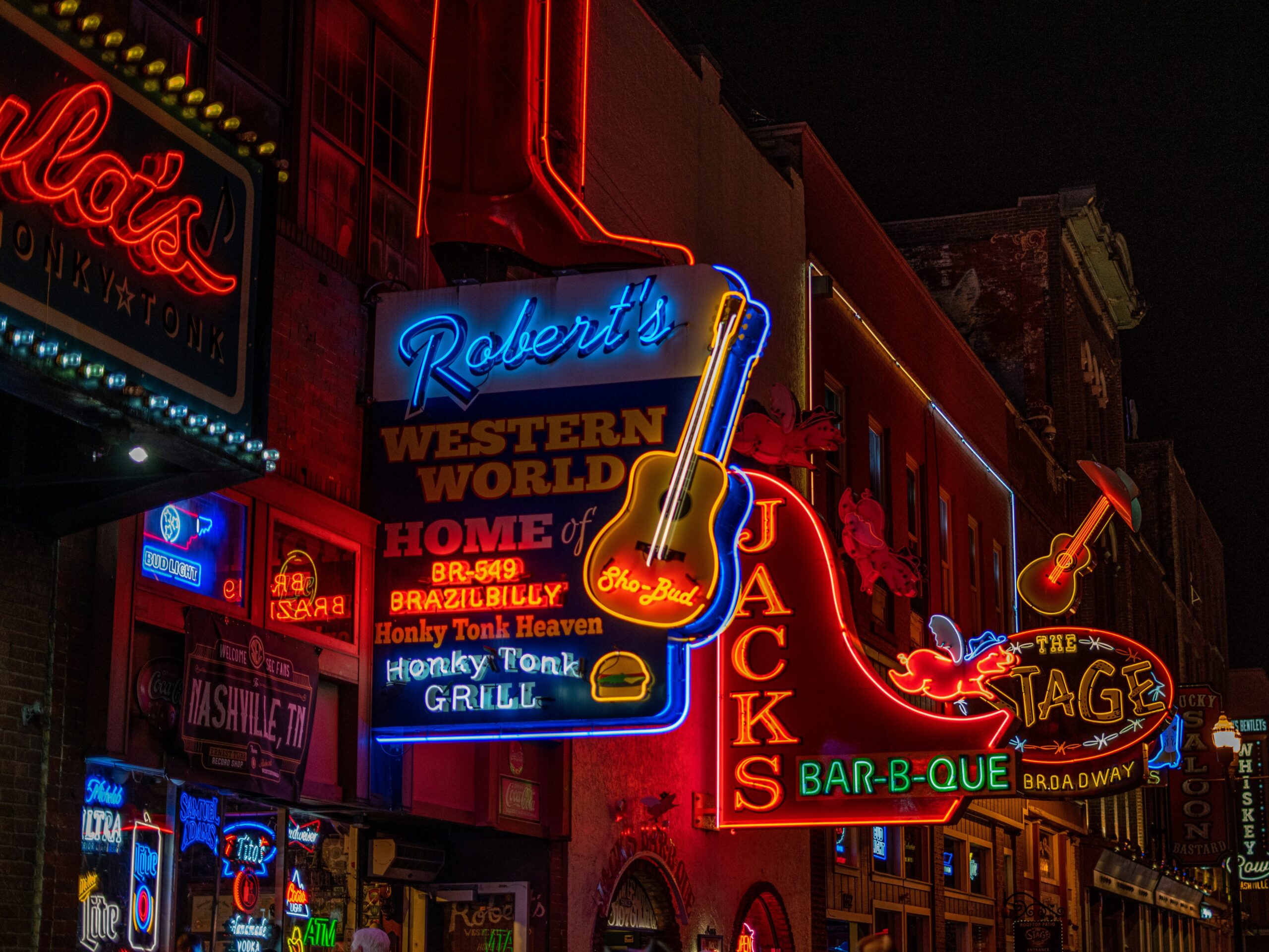 Neon signage of honky-tonks on Broadway in Nashville